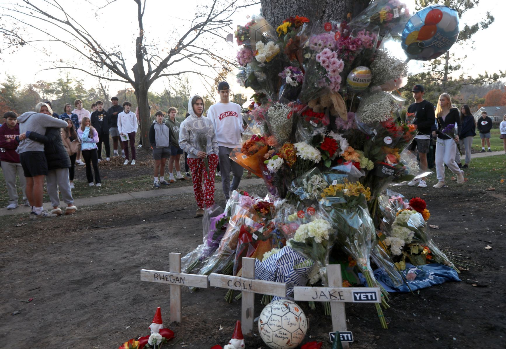 Hundreds visit the memorial site of car crash where 3 teens died